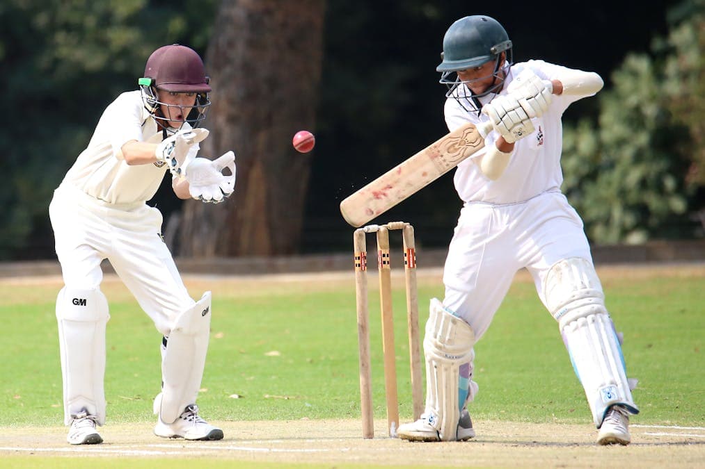 Boys Playing Cricket
