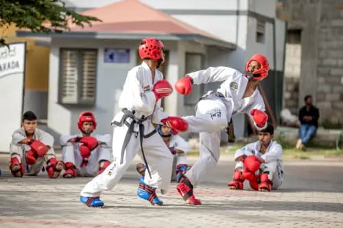 Practicing Taekwondo