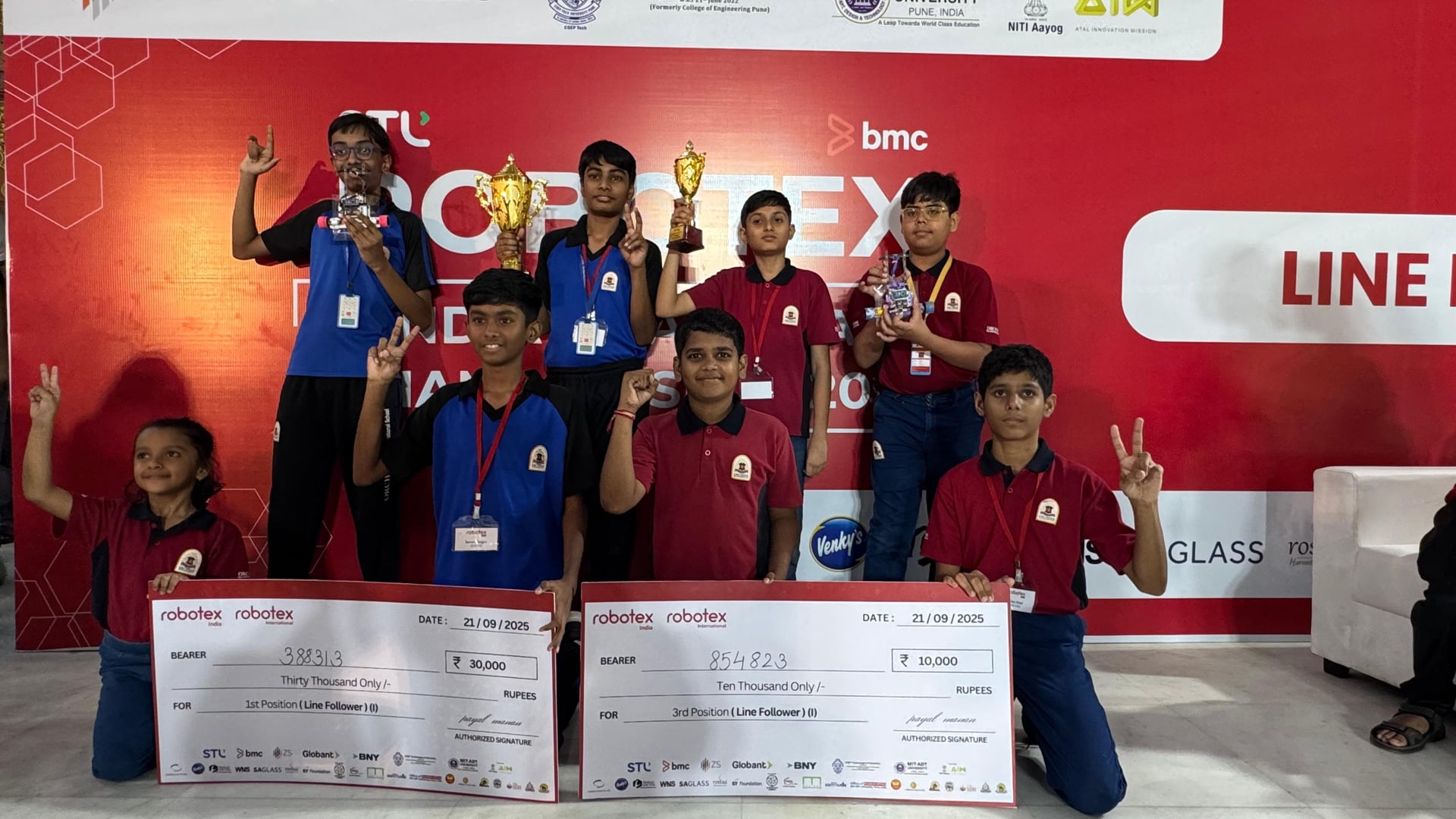 Orchids' students celebrate 1st and 3rd place wins at the 2025 Robotex India National Championship in Pune