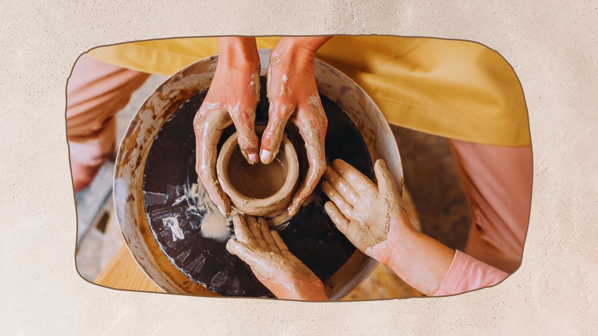 Clay, creativity and connection: Unleashing the miraculous benefits of pottery for kids Children and an adult shaping clay on a pottery wheel